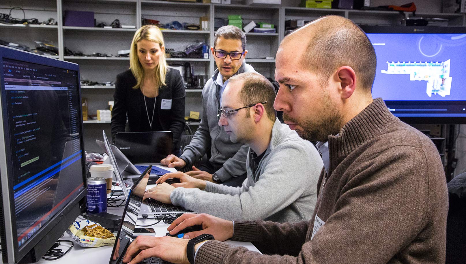 The team collaborating at a desk