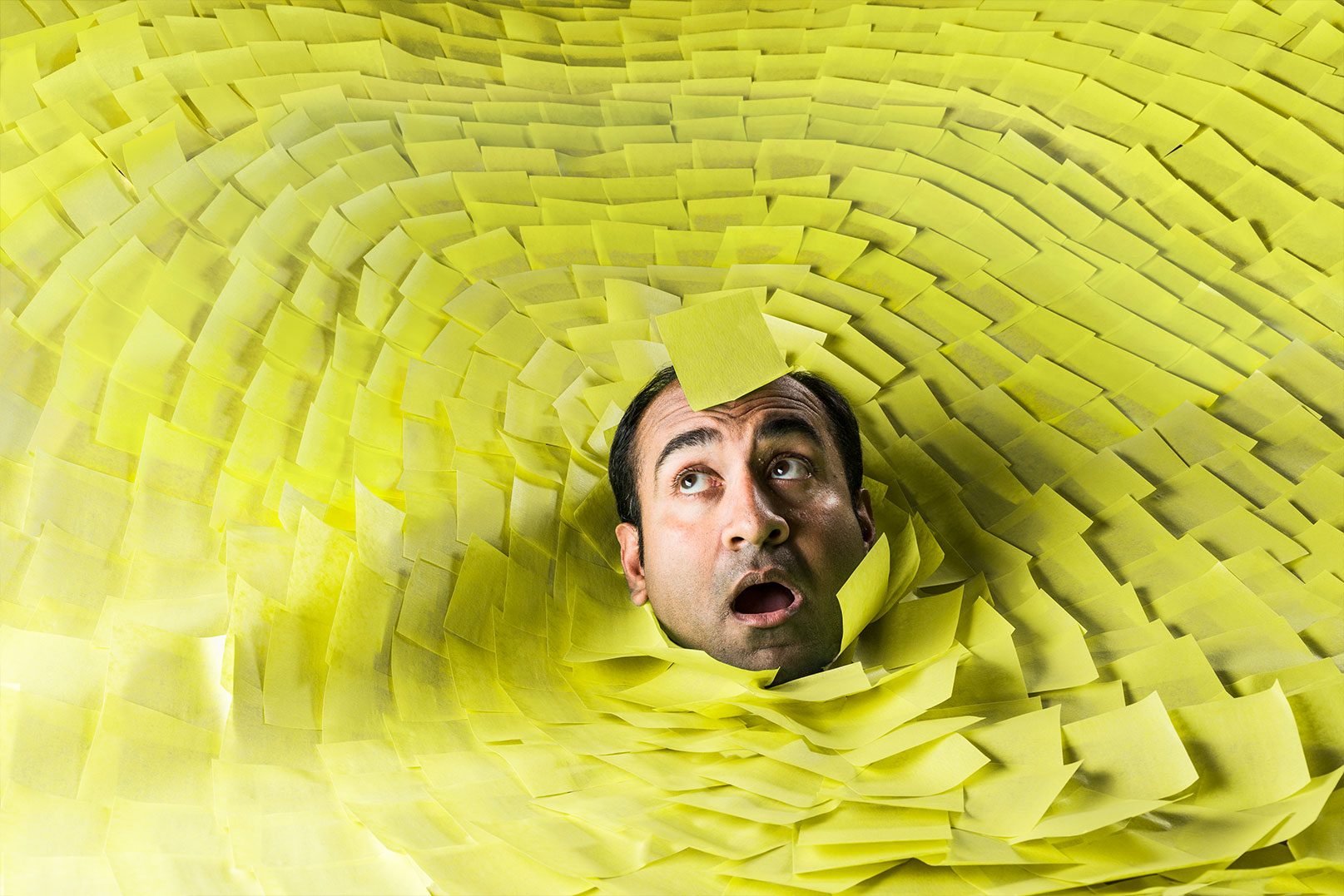 Rohit buried in post-it notes.
