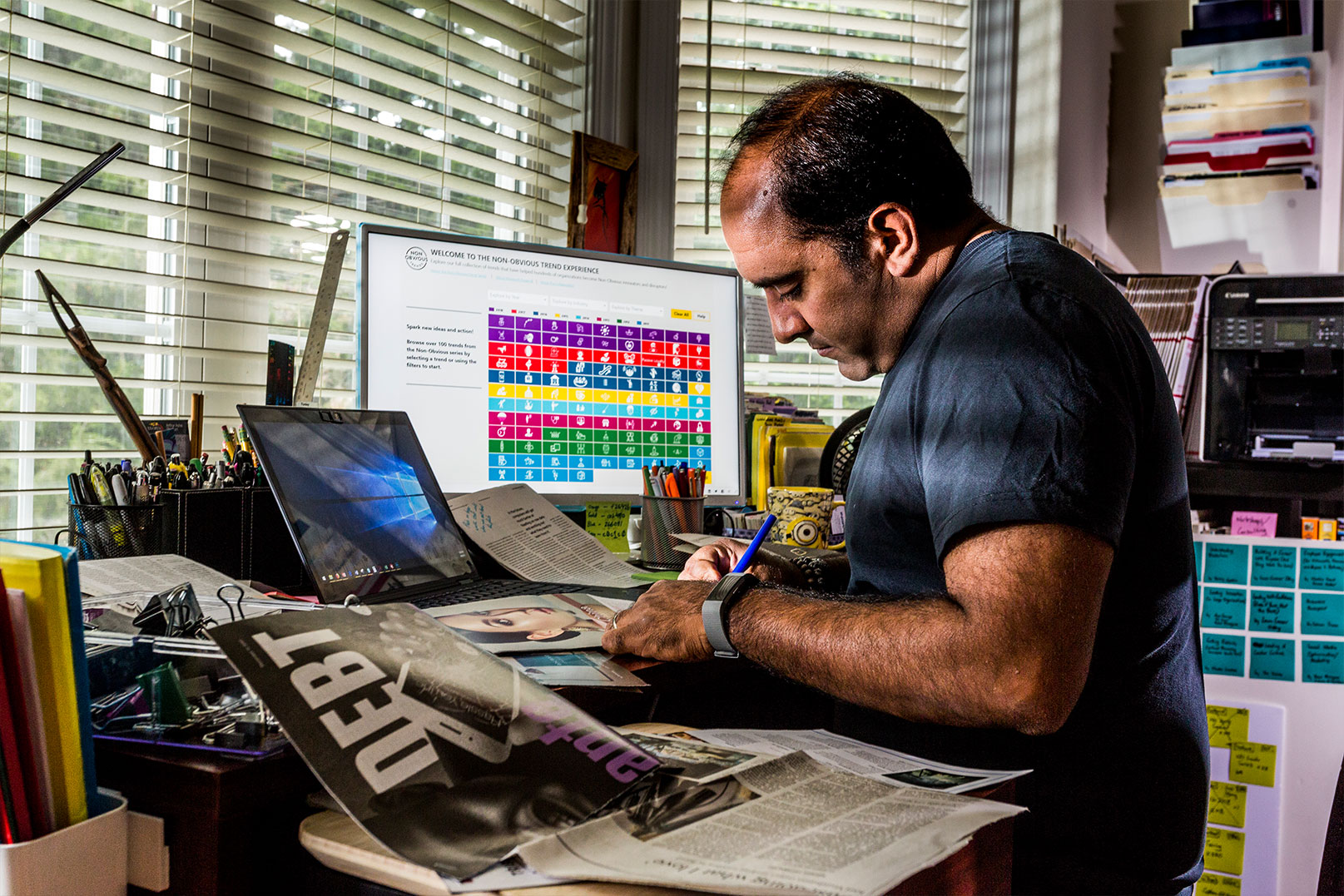 Bhargava siting at a desk working.