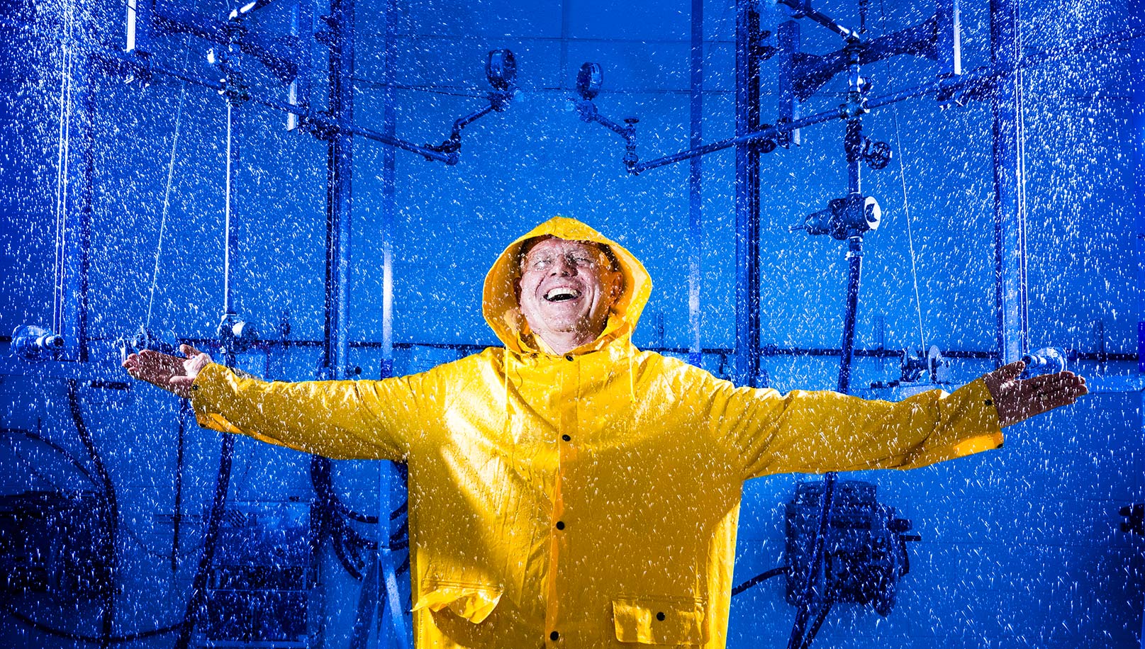 Bob getting rained on in the rain test lab