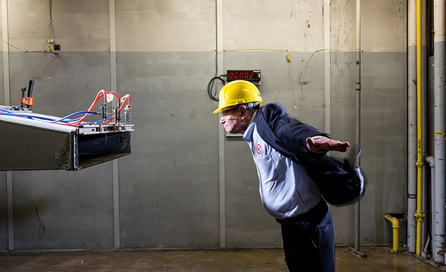 John leaning against the wind